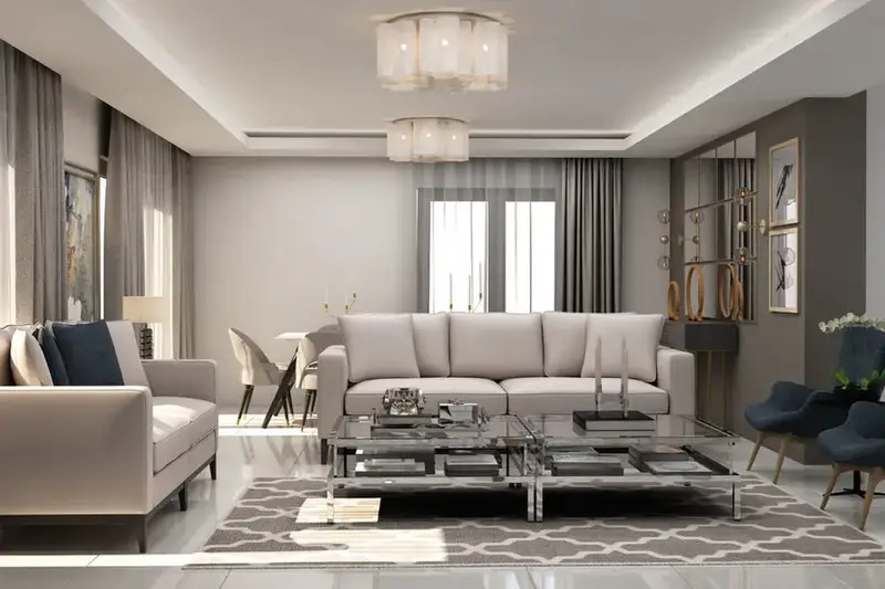 Villa Göktürk salonu, bej koltuk takımı, cam orta sehpa ve tavanda kristal aydınlatmalar