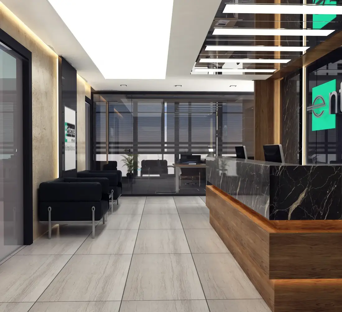 Gürbaşlar Plaza ofis katı, mermer desenli karşılama bankosu, siyah bekleme koltukları ve cam cephe