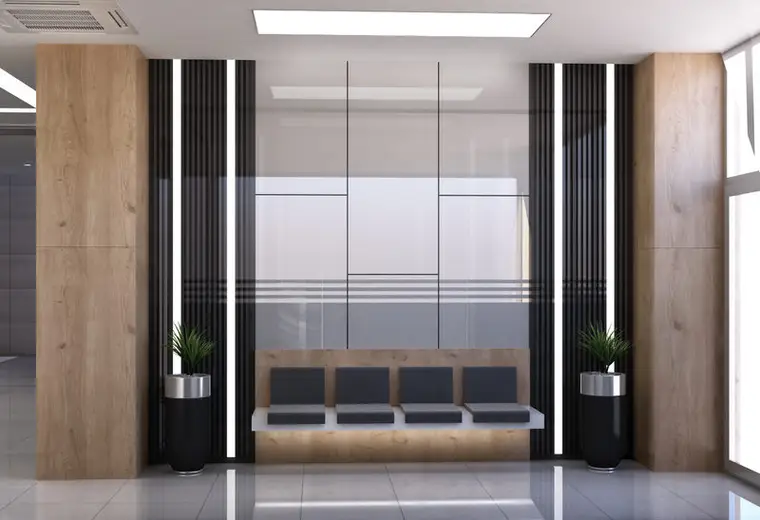 Hospitadent Çamlıca bekleme alanı, ahşap panel ve siyah lamel duvar, dörtlü bekleme koltuğu