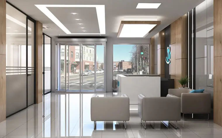 Hospitadent Çamlıca klinik girişi, cam giriş cephesi, bekleme koltukları ve resepsiyon bankosu